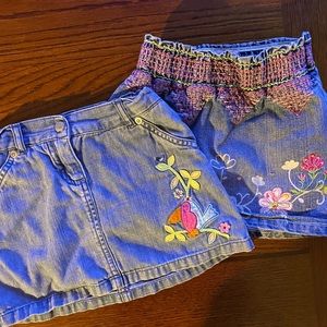 Two denim toddler skorts